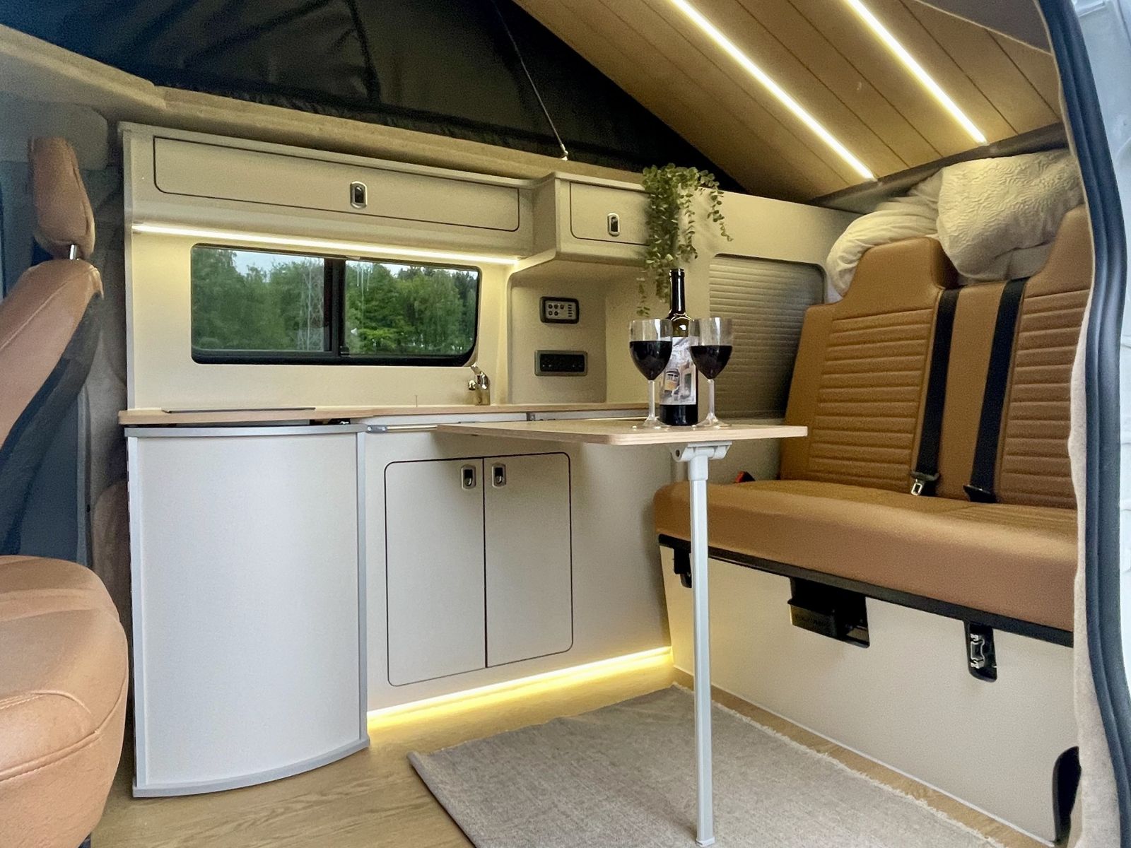 Kitchen with table up: Ready for dinner on the road.